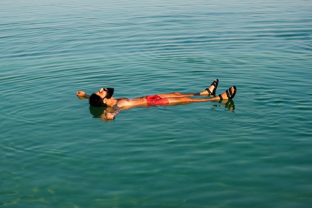 man, dead sea, floating-6739411.jpg